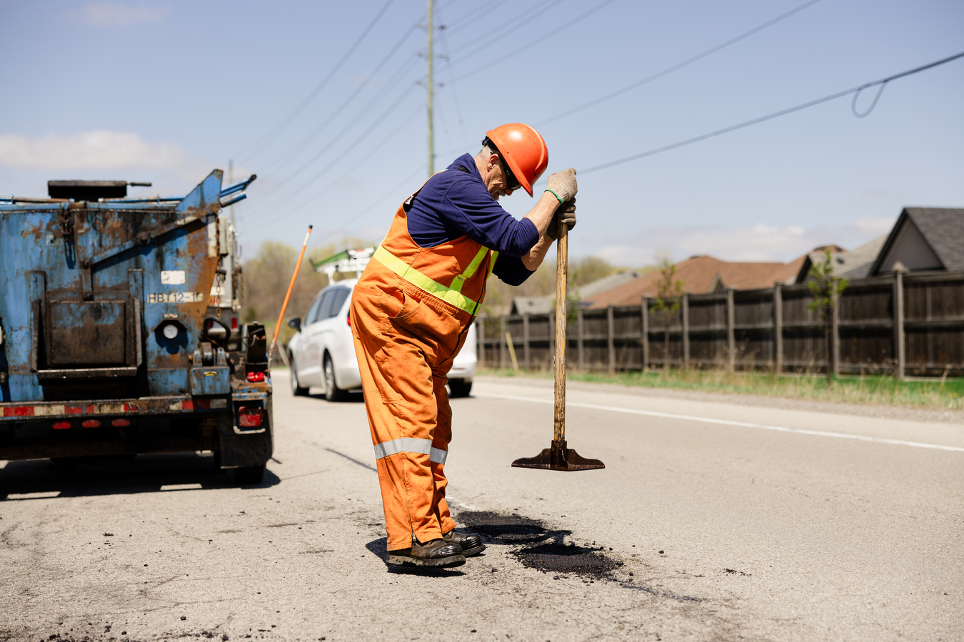York Region staff repair pot hole on Regional Road