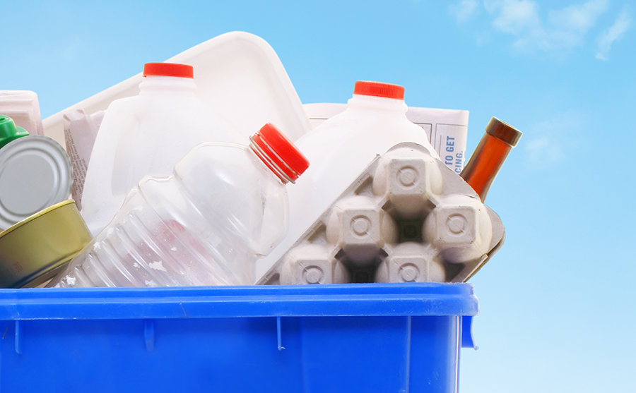 Recycled materials in a blue bin