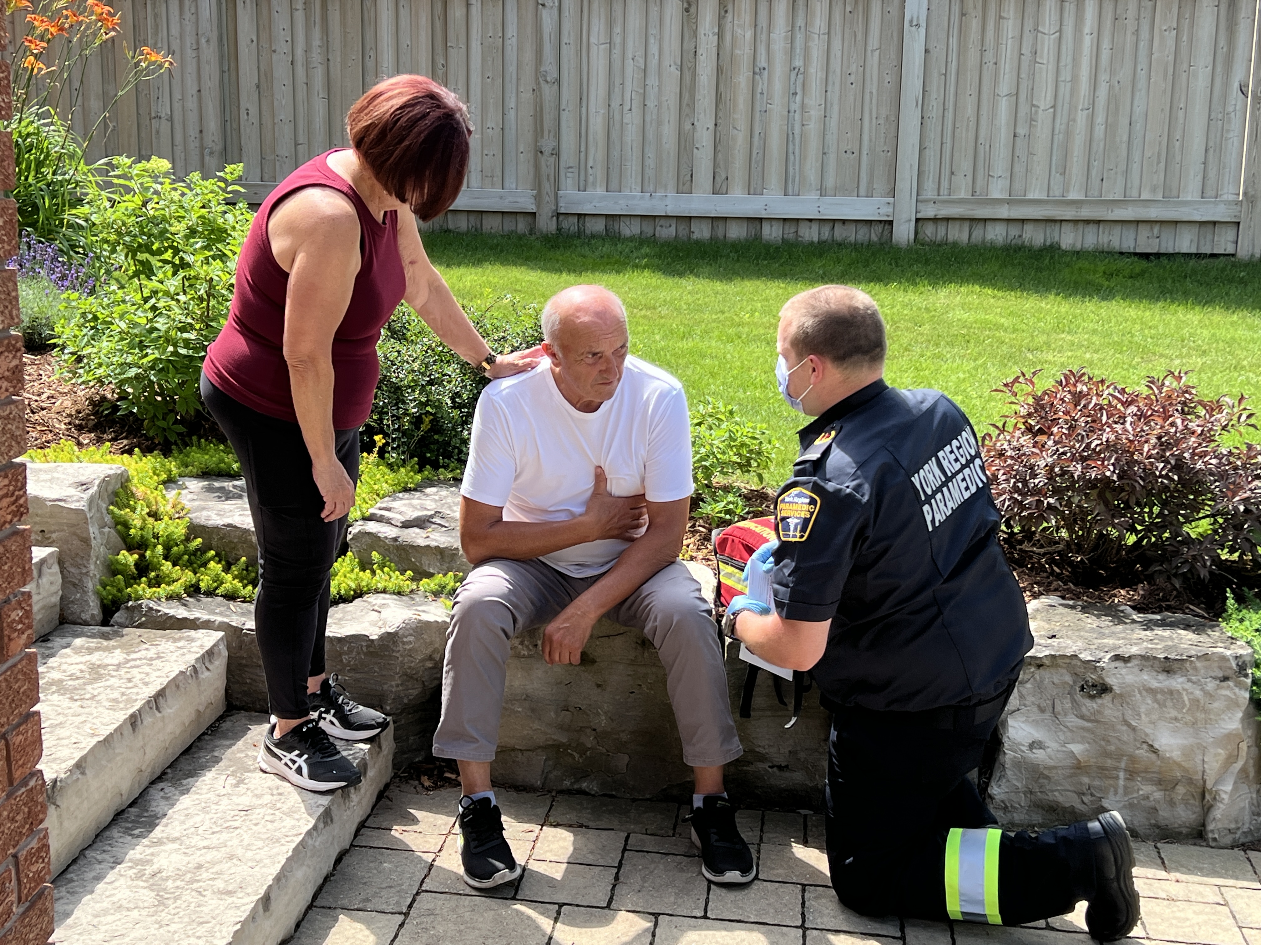 paramedic helping senior couple who called 911