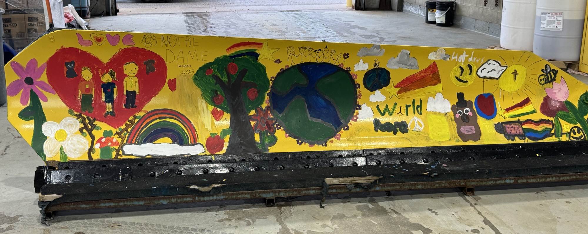 Notre Dame Catholic Elementary School plow design 2025