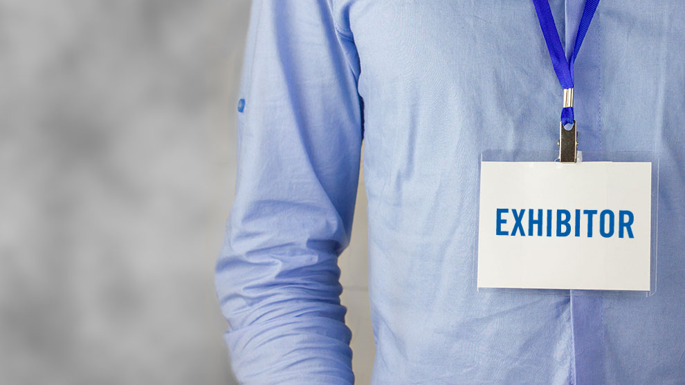 Person wearing an exhibitor pass