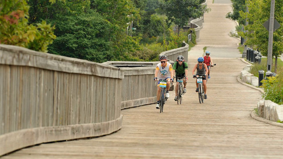Riding bikes on a boardwalk