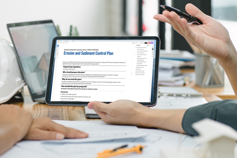 Tablet screen showing terms of reference with two pairs of hands