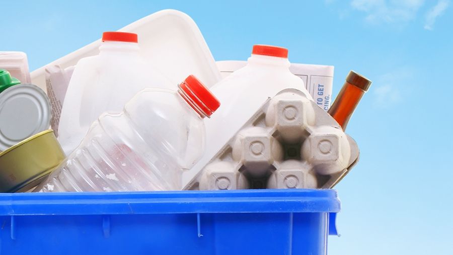 Recycled materials in a blue bin