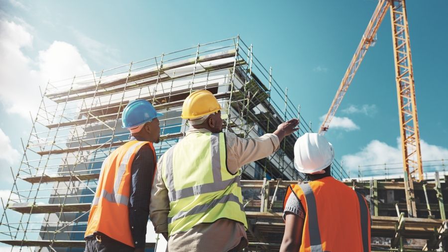 Engineering, construction site and team outdoor for building project, planning and architecture.