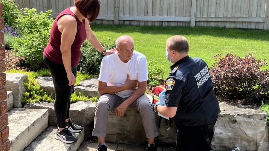 paramedic helping senior couple who called 911