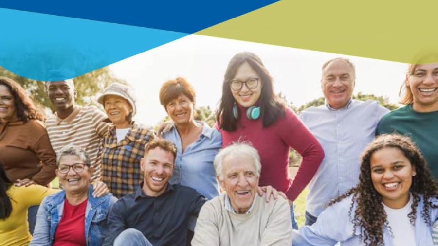 Group of multigenerational people smiling in front of camera