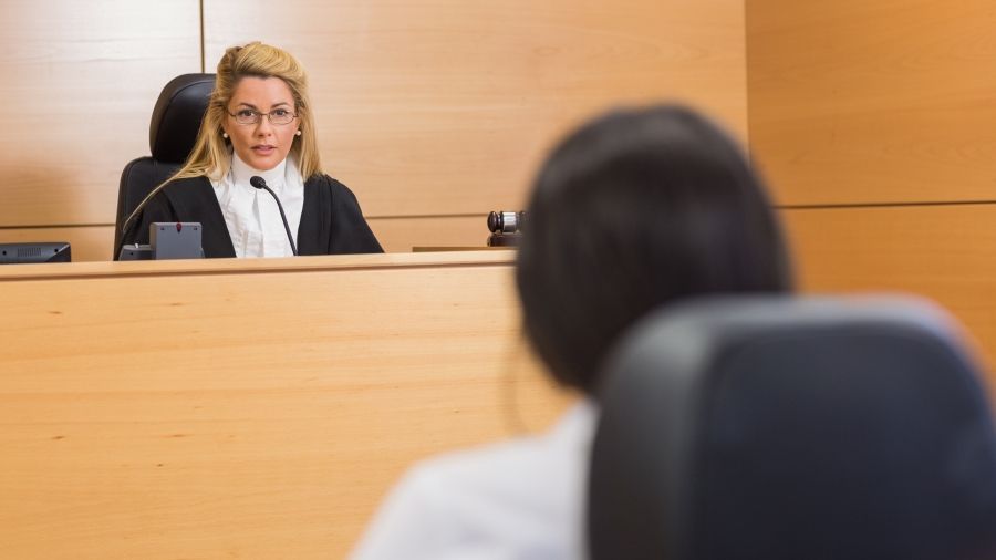 Sitting judge in a courtroom