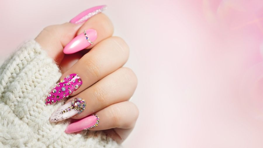 hand showing pink manicured nails