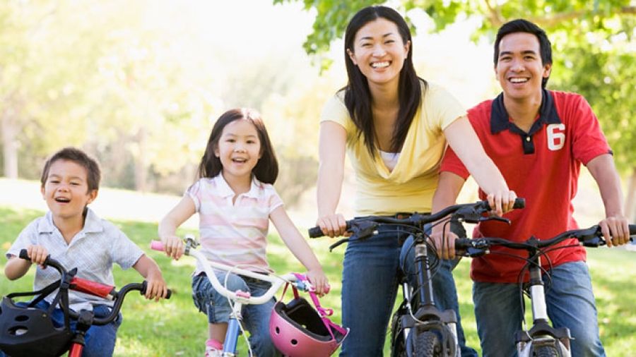 Family out on a bike ride.