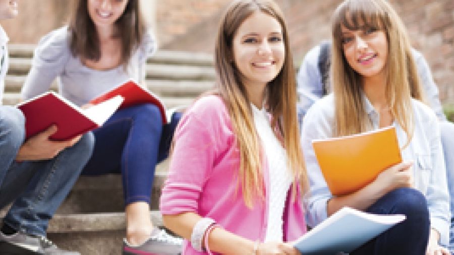 Students on steps outside of school