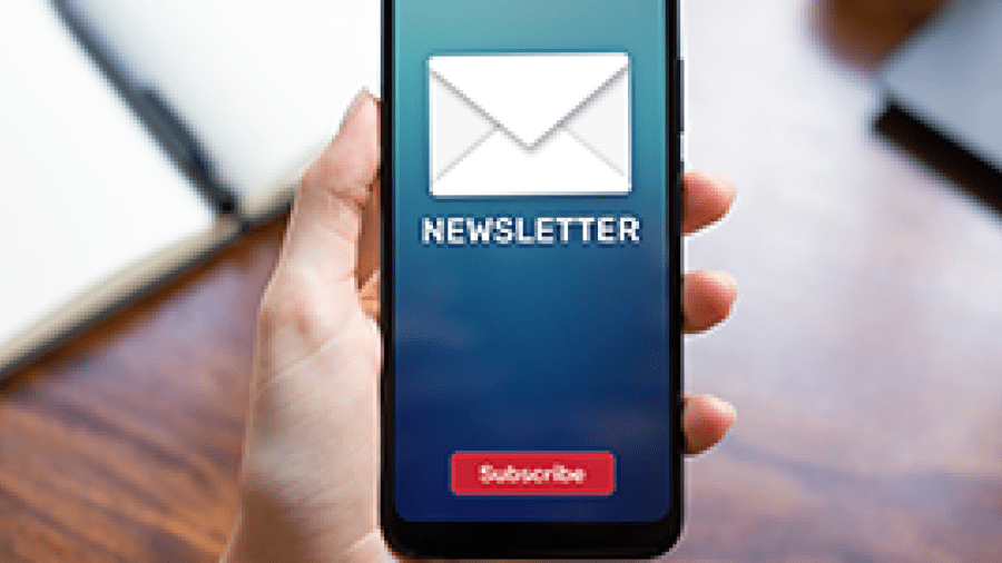 A mobile phone with an email labelled newsletter and a subscribe button
