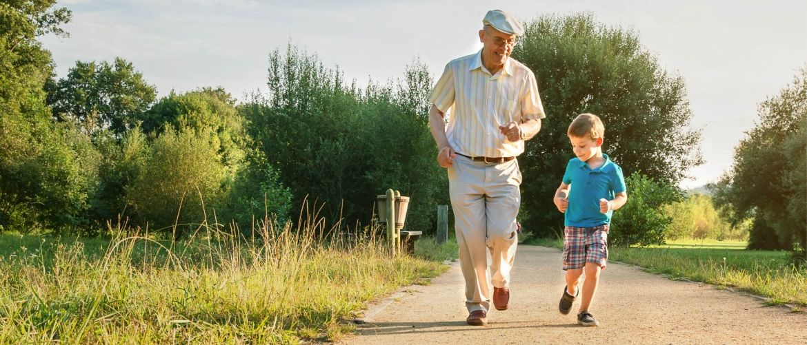 A man and child running