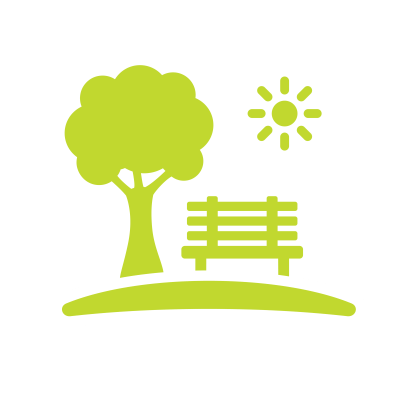 A tree, park bench and the sun representing the natural environment