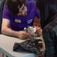 At a repair cafe, fixing a broken item