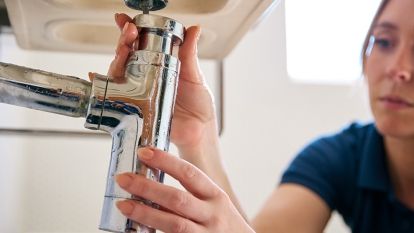 Hands on water tap