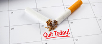 A calendar with a broken cigarette and the text Quit Today!